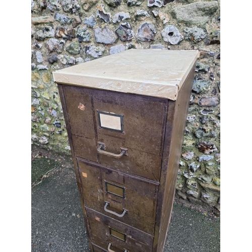 1816 - A vintage metal four drawer filing cabinet, 132cm high x 38.5cm wide x 64cm deep, excluding handles.... 