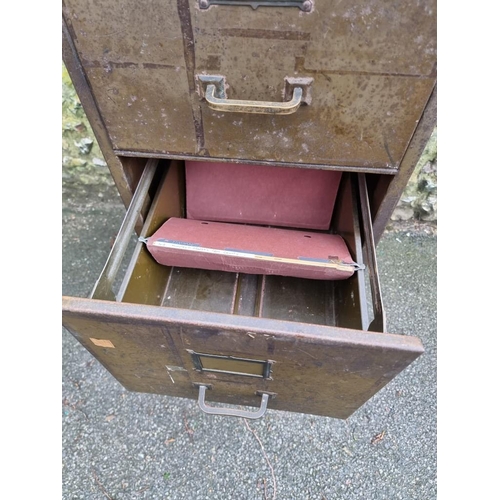 1816 - A vintage metal four drawer filing cabinet, 132cm high x 38.5cm wide x 64cm deep, excluding handles.... 