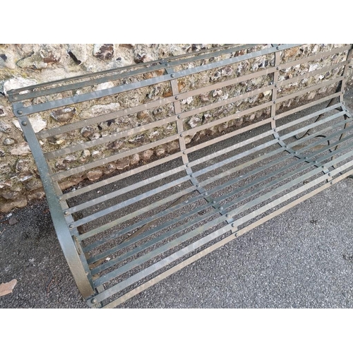 1818 - A green painted wrought iron park bench, having scroll ends, 178cm wide x 79cm high.... 