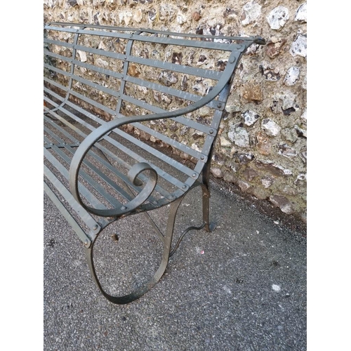 1818 - A green painted wrought iron park bench, having scroll ends, 178cm wide x 79cm high.... 