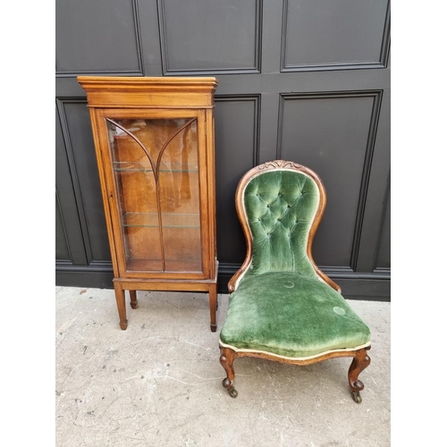 1819 - A Victorian walnut and green upholstered occasional chair; together with an Edwardian display cabine... 