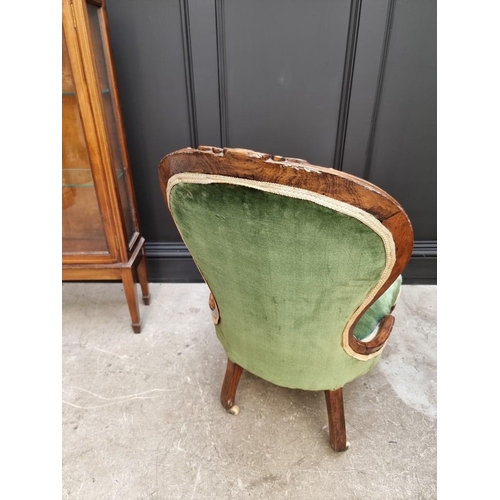 1819 - A Victorian walnut and green upholstered occasional chair; together with an Edwardian display cabine... 