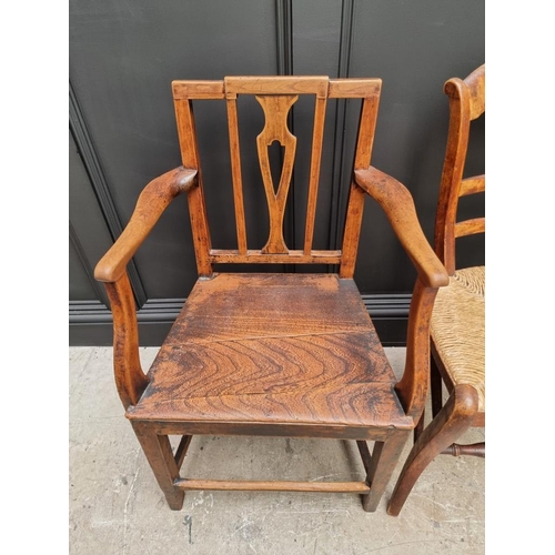 1823 - A pair of early 19th century elm dining chairs; together with another elm elbow chair; and another r... 