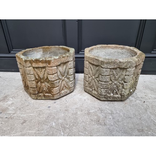 1786 - A pair of composition stone octagonal garden planters, 25.5cm high.