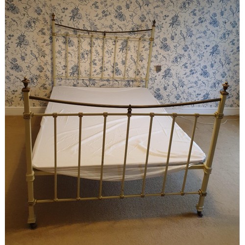 1810A - A Victorian cream painted brass bed. 