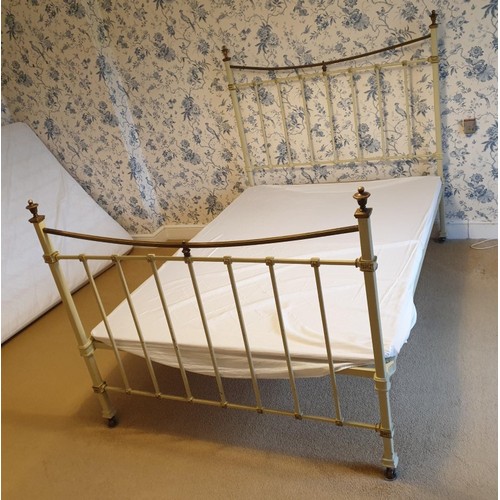 1810A - A Victorian cream painted brass bed. 