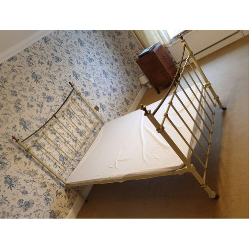 1810A - A Victorian cream painted brass bed. 