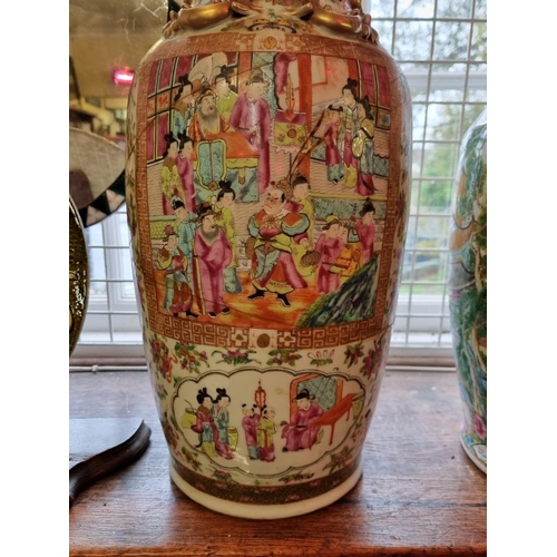 1681 - A large Chinese famille rose twin handled vase, 19th century, 61cm high, (extensive repairs).... 