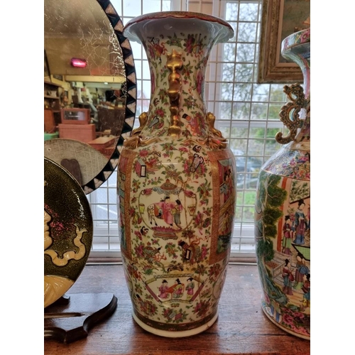 1681 - A large Chinese famille rose twin handled vase, 19th century, 61cm high, (extensive repairs).... 