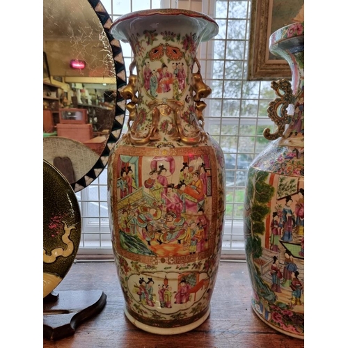 1681 - A large Chinese famille rose twin handled vase, 19th century, 61cm high, (extensive repairs).... 