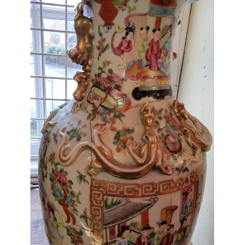 1683 - A large Chinese famille rose twin handled vase, 19th century, 44cm high, (extensive repairs).&n... 