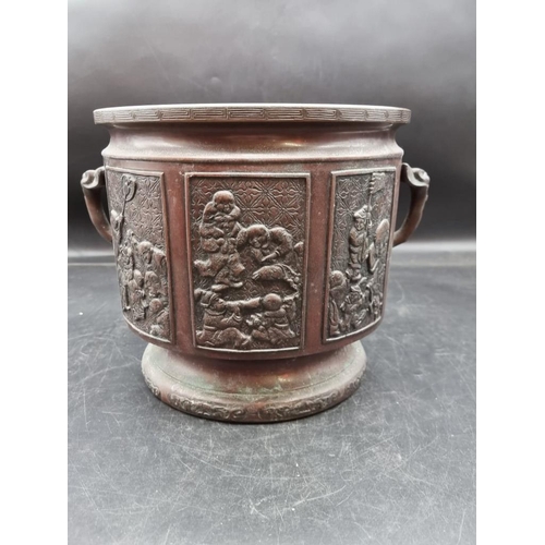 1798 - A Japanese bronze twin handled jardiniere, Meiji, 24cm high. 