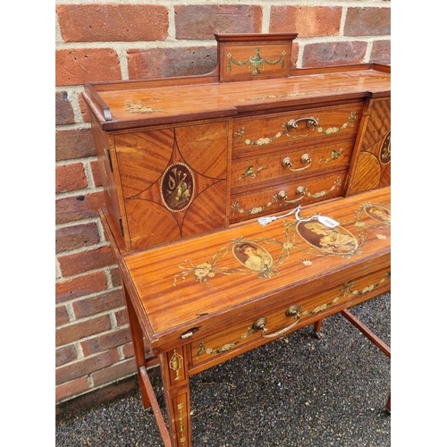 1038 - A good late Victorian satinwood, painted, line inlaid and crossbanded bonheur du jour, in the m... 