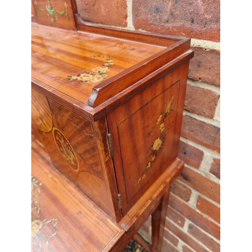 1038 - A good late Victorian satinwood, painted, line inlaid and crossbanded bonheur du jour, in the m... 