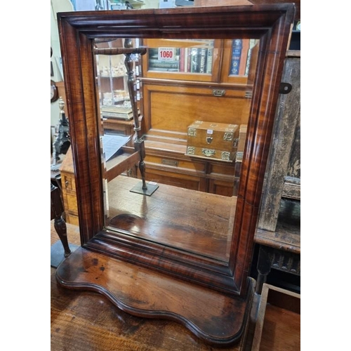 1060 - An unusual 19th century mahogany framed rectangular mirror, of good colour, with apron shelf, 55cm h... 