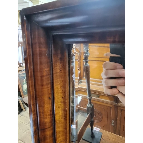 1060 - An unusual 19th century mahogany framed rectangular mirror, of good colour, with apron shelf, 55cm h... 