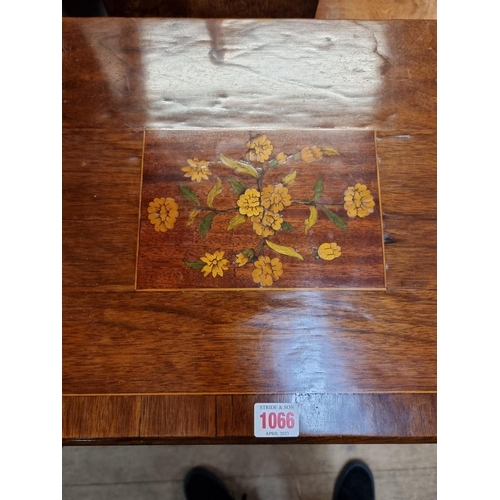 1066 - A Victorian walnut and inlaid pier cabinet, 53.5cm wide.