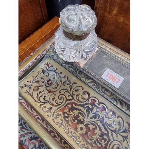 1067 - A 19th century tortoiseshell and brass Boulle desk stand, 37cm wide, (s.d.).