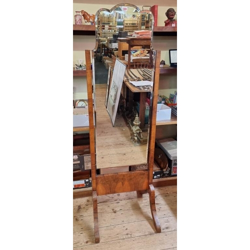 1089 - A 1930s walnut cheval mirror, with bevelled plate, 51.5cm wide. 