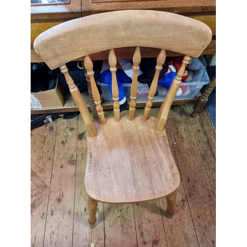 1101 - An old pine kitchen table and a set of eight beech and elm chairs, the table 180cm long. ... 