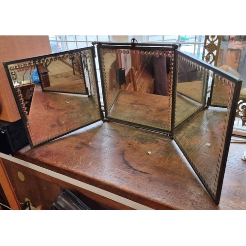 1106 - An unusual late 19th century sliding triptych mirror, each panel 27cm square.