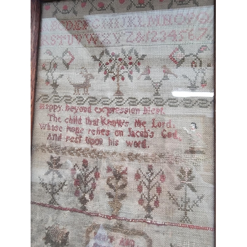 1133 - A 19th century needlework sampler, 42.5 x 22.5cm, (a.f.). 