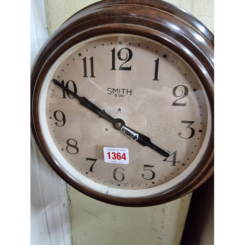 1364 - A vintage Smith brown Bakelite wall clock, 29cm diameter. 