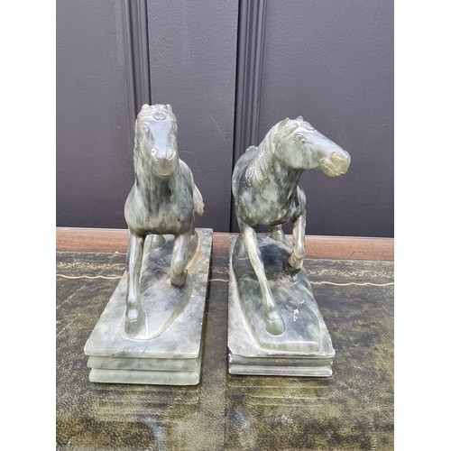 1488 - Two similar Chinese green soapstone horses, largest 15.5cm high, (repairs to one). ... 