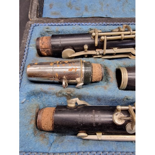 1800 - A Czechoslovakian clarinet in fitted case; together with a trombone, in case; and a violin, in case.... 