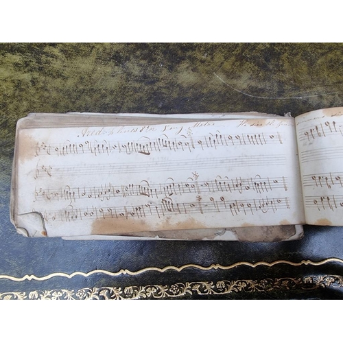 208 - MANUSCRIPT MUSIC: four volumes of manuscript church music, early 19thc, the volumes variously worn a... 