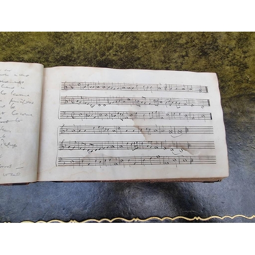 208 - MANUSCRIPT MUSIC: four volumes of manuscript church music, early 19thc, the volumes variously worn a... 