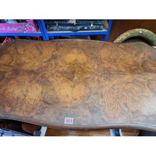 1815 - A Victorian figured walnut card table, 95cm wide.