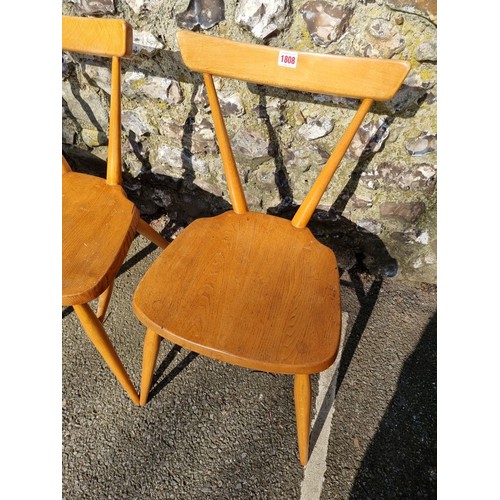 1808 - Five various vintage Ercol dining chairs, comprising a set of three and a pair.