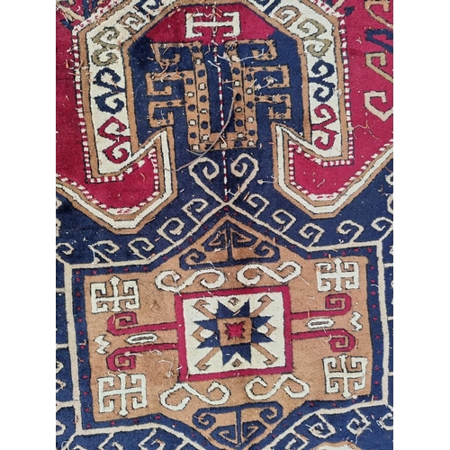 1002 - An old Karabakh rug, 198 x 148cm. 