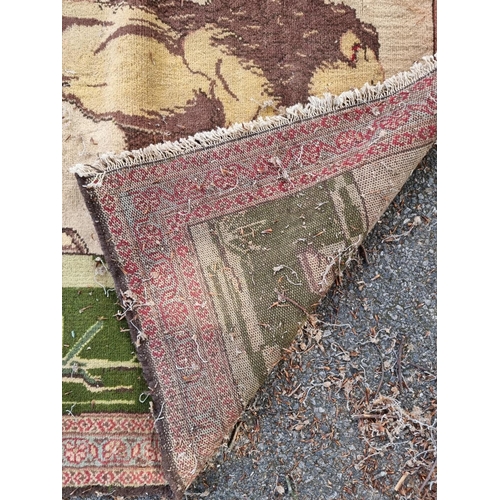1003 - A lion design rug, with floral borders, 150 x 106cm. 