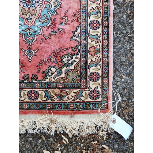 1007 - A small silk prayer rug, having central medallion, 58 x 48cm.
