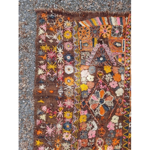 1015 - A floral flatweave rug, 226 x 168cm. 