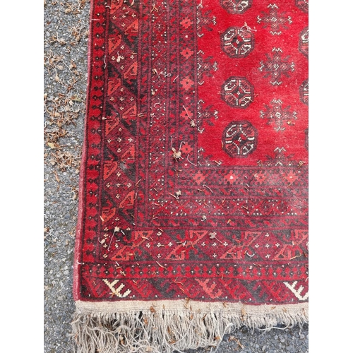 1019 - A Bokhara runner, having repeated geometric design, 289 x 96cm.