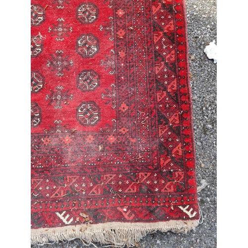 1019 - A Bokhara runner, having repeated geometric design, 289 x 96cm.