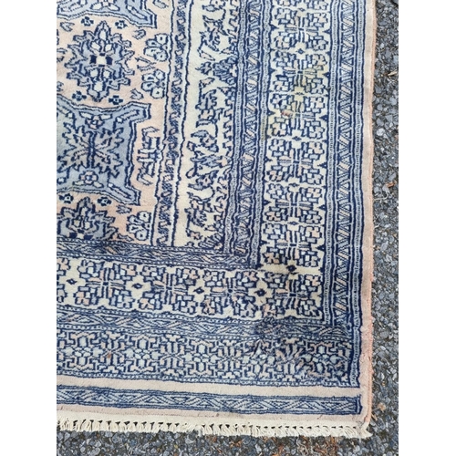 1021 - A Bokhara rug, having repeated design, 192 x 126cm. 