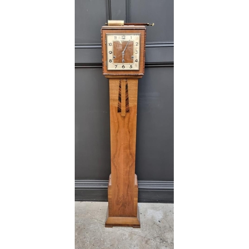 1024 - A 1930s Art Deco walnut and coromandel crossbanded grandmother clock, 139cm high; together with anot... 