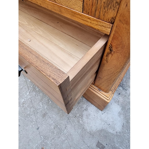1027 - A contemporary oak bookcase, 90cm wide. 