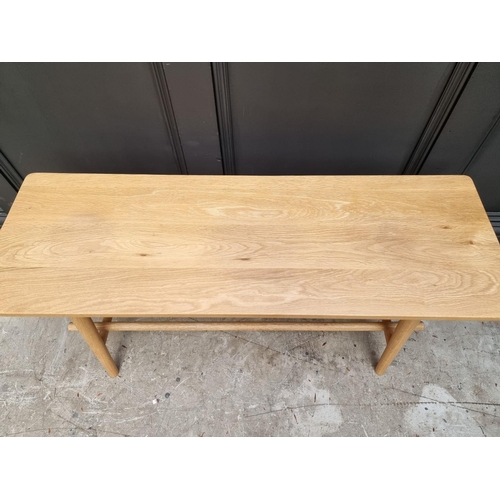 1031 - A contemporary pale oak rectangular low occasional table, 100cm wide.