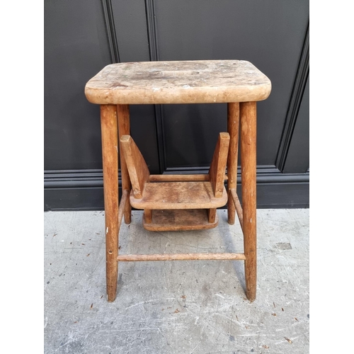 1036 - A beech metamorphic stool. 
