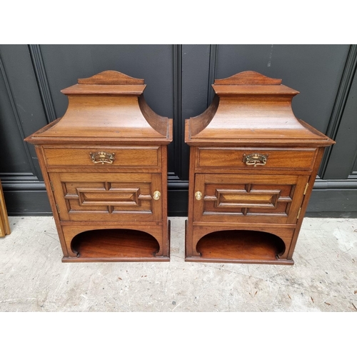 1043 - A pair of antique mahogany cabinets, 61cm high x 39.5cm wide, (formerly part of a larger item). (2)... 