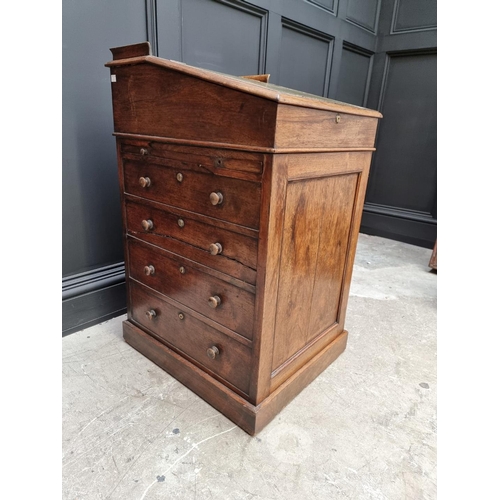 1045 - An early 20th century rosewood Davenport, 51cm wide. 