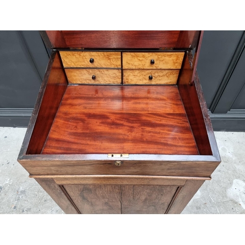 1045 - An early 20th century rosewood Davenport, 51cm wide. 