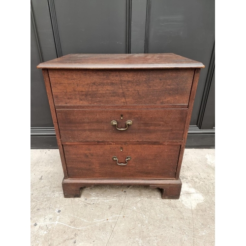 1051 - An antique mahogany chest of drawers, with hinged top, 69.5cm wide, (alterations). ... 