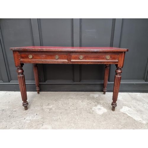 1052 - A 19th century mahogany desk, stamped 'M Willson, Great Queen St', 120.5cm wide.