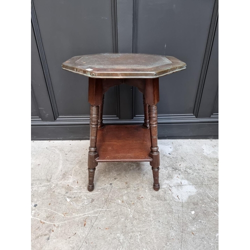 1057 - A circa 1900 mahogany and hammered copper octagonal occasional table, 52cm wide. ... 
